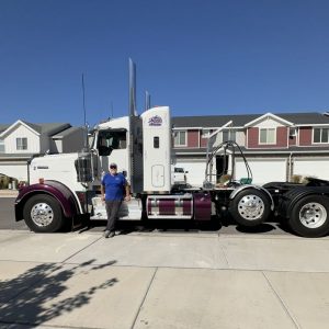 Matt with his white Kenworth truck